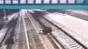 Drunk Russian Falls Off Platform Onto Train Track