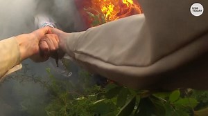 Deputy smashes window, pulls driver from burning car in dramatic rescue