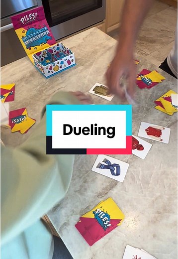 Exciting PILES Card Game Rivalry in Action