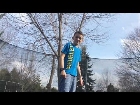 Boy pants fall down doing backflip