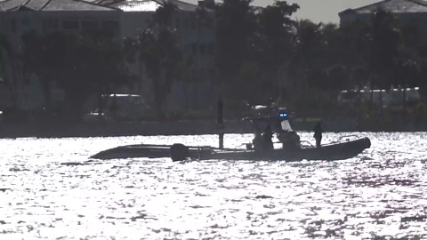 Emergency officials work the scene of a boat crash in Florida