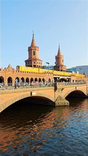 🚆 YELLOW TRAIN Glides Over Berlin’s Iconic Oberbaum Bridge
