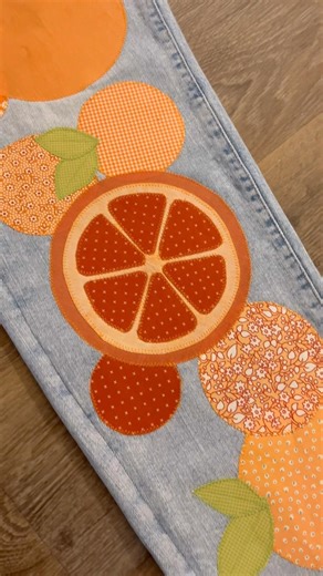 It’s finally spring so I sewed orange slices onto my old jeans