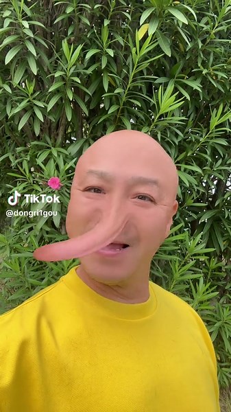 Bald Man in Yellow Shirt Nose Stretching Meme