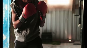 African American male boxer practicing boxing with trainer in fitness studio 4k | Free Stock Video Footage