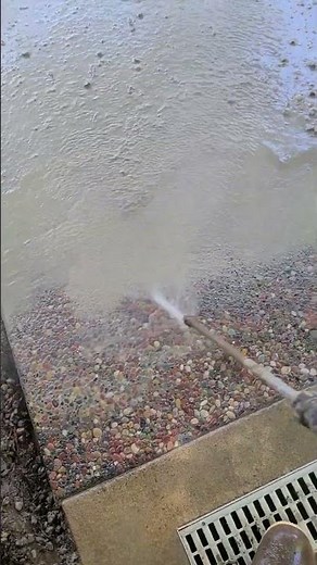 washing seeded exposed aggregate concrete #construction #concrete