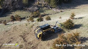 Tired of battling stubborn brush and trees? Watch as the Loftness Bad Ax effortlessly tackles the most challenging vegetation. | Loftness