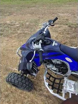 How to wheelie a 4wheeler for beginners