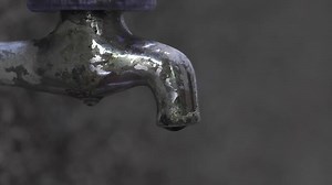 Download slow motion water dripping from the tap for free