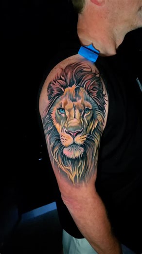 Chase Elsberry on Instagram: "Strength. Patience. Vision. 🦁 A work in progress on this lion — building depth with opaques, orange yellow ochre, and warm brown tones to bring the energy to life. Next pass will lock in those bold color layers and contrast. Every stroke tells a story… this one roars. 🔥 Ready to bring your vision to skin? Let’s create something powerful - Realism • Color • Black & Grey — versatility is key. Let’s build your idea. Link in bio to book📅 - #ElevenMagTattoo #gltattoos