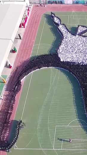 World Record: Largest Transforming Human Image with 5,445 Participants
