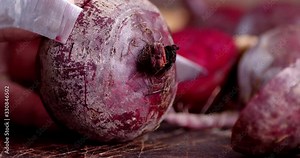 Sliced fresh beets on a cutting Board.