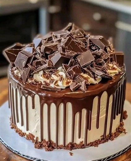 Epic Chocolate Overload Explosion Cake "The moment I pulled this beauty out of the oven, my kitchen turned into a chocolate paradise—rich, gooey, and utterly irresistible! It was like a celebration in every slice, and I couldn't help but share it with friends who instantly became fans." Ingredients 2 cups all-purpose flour 1¾ cups granulated sugar 1 cup unsweetened cocoa powder 4 large eggs Reacipe in First Coʍmеոτ | The Good Old Days | Facebook