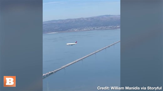 A crazy optical illusion, caused by a passenger filming a plane from the window of another flight, made a jet in flight headed to San Francisco look completely stationary in the middle of the sky. | Breitbart