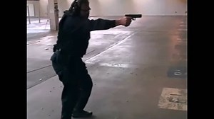 CIRCA 1990s - Shooters work on movement drills for a tactical advanced pistol program in 1998.