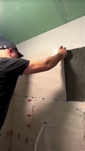 Ceramic tile installation process for large building wall surfaces