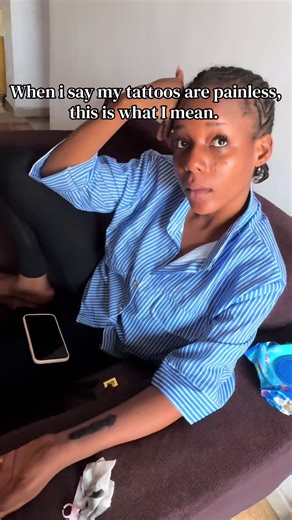 You know your tattoo artist is good when your client is so relaxed she forgets she's getting a tattoo. No pain. No stress. Just clean lines and premium numbing. #painlesstattoo #tattooartist #viralvideotiktok #creatorsearchinsight #tattootok