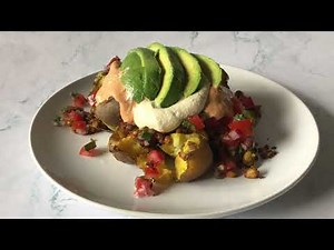 The Ultimate Vegan Nachos with sour cream and cheddar cheese sauce