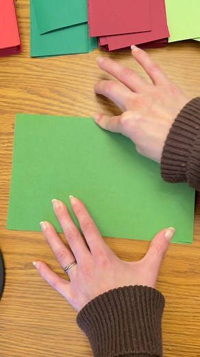 How to make paper chain garland ✨ Supplies needed: 1 50pc stack of paper (construction, cardstock, ect.) Stapler (use can also use tape or glue) Paper cutter or scissors Directions: 1. Fold each piece of paper into 4 even sections. I first fold in half with paper sitting long way. Then open and fold each side to the middle. 2. Cut along each fold you made for every piece 3. Sort into the pattern of your choice 4. Assemble - grab one piece at a time and loop it in a circle. Stable the middle to h