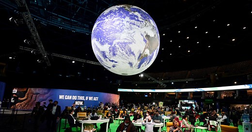 COP26 draft climate deal urges countries to step up goals