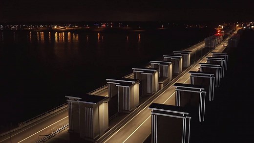 We presume that you haven't seen the iconic Afsluitdijk like this before! As part of the renovation programme of the Afsluitdijk, the artist Daan Roosegaarde enhances the iconic Afsluitdijk with a second layer of light and interaction. One of them is the Gates of Light that is a futuristic entrance at both sides of the dike. | Visit Netherlands