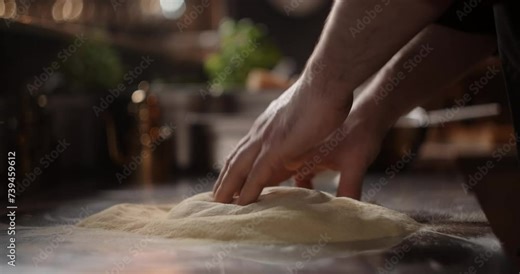 Process of the Neapolitan pizza making in the pizzeria