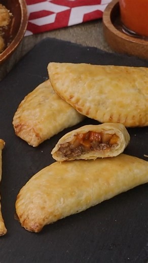 Beef Empanada with golden, flaky crust filled with savory meat and spices. They're simple comfort food at its best, perfect for a snack or quick meal. | Kawaling Pinoy Recipe Blog