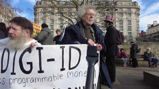 Part 2 of Piers Corbyn's famous phrase 'Resist defy do not comply' protested against Digital ID in London, UK