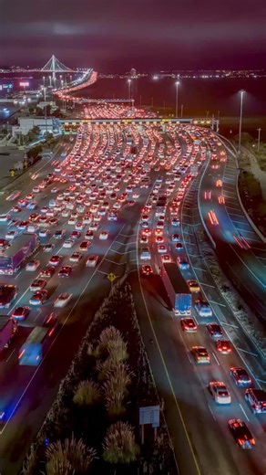 Toll on the Oakland/San Francisco Bay Bridge is rising to $8.50 in 2026. Just $0.50 isn’t so bad. . Legal info: This was shot with an approved FAA waiver targeting this stretch of the bridge/toll plaza directly over traffic, specifically 14 CFR 107.145. . . #sanfrancisco #baybridge #california | Eric Thurber Photography