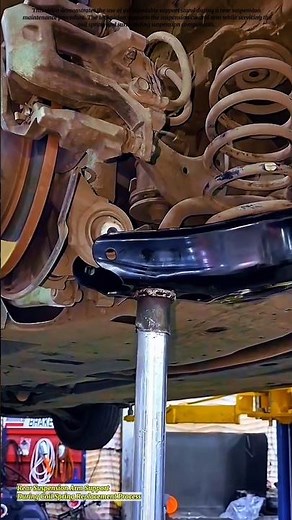 Rear Suspension Arm Support During Coil Spring Replacement Process