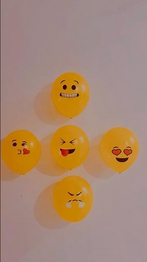 Emoji balloons bursting