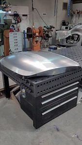 Got the new trunk skin welded and finished out. It sits naturally on the model without fighting anything 🙌. It’s one of those panels that looks simple, but the outer edge curve accelerates out of the main shape and will catch you out if you don’t stay on top of it - especially stretching them in this way. Happy with how this one turned out. #brownesmetalcraft #metalshaping #powerhammer #pettingell | Browne's Metalcraft