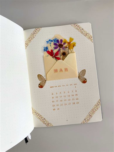 Hello March 🌸 Soft petals, tiny details, and a page blooming with fresh beginnings. March arrives like a letter filled with color, bringing gentle days, light air, and stories ready to unfold. A month for growth, quiet hope, and little creative rituals. Let this spread hold the feeling of starting again, slowly and beautifully. Discover our Spring Essentials on PaperWrld ✨ What does March feel like for you? 🌷 #paperwrld #paperwrldshop #marchspread #bulletjournal #journalingcommunity