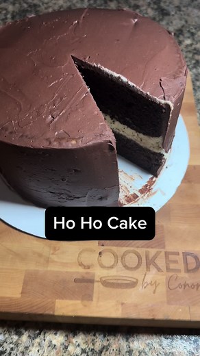 This Ho Ho Cake is a must try! Ingredients Cake 1 box of devils food cake or chocolate cake 1 3.9 oz package of instant chocolate pudding 4 eggs 1 c sour cream 1/2 cup warm water 1/2 cup vegetable oil Filling 1 cup milk 5 T flour 2 t vanilla 1 c softened butter 1 c sugar Chocolate Topping 12 oz semi sweet chocolate chips 1 T sugar 1 1/2 c heavy cream Directions 1. Preheat oven to 350°F 2. Mix cake mix, pudding, sour cream, eggs, warm water, and oil until well mixed. Split cake batter between two