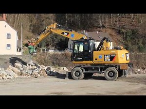 Caterpillar CAT M318D with Montabert breaker