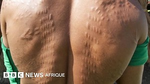 Les hommes 'crocodiles' de Papouasie-Nouvelle-Guinée - BBC News Afrique