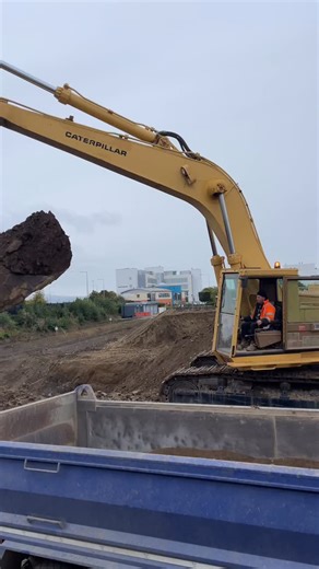 Awesome Earthmovers on Instagram: "Cat 245 loading a truck at a basement excavation in Dublin, Ireland"