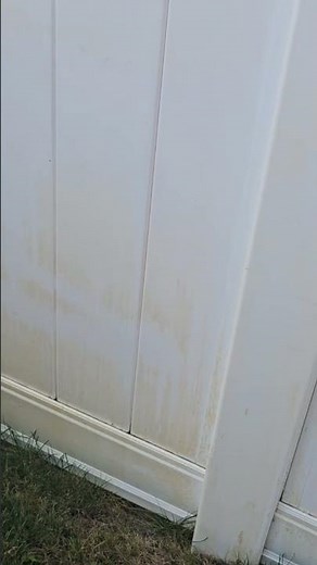 Rustaid rust stain remover on white vinyl fence