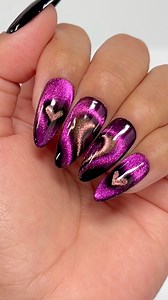 Cool & Easy Magnetic Cat Eye Hearts Nails 💗✨🧲 These vibrant heart cat eyes are pure Valentine magic 💖 Comment “HEARTS” for the 🔗 to everything you need to recreate this look! Save & share for Valentine’s nail inspo! Using @daily_charme: 💖 C61 Athena 💜 C62 Venus 🖤 001 Perfect Black 🧲 Long Rectangle Cat Eye Magnet Bar 🐈‍⬛ Cat Eye Magnet Cylinder Wand 💅 Medium Almond Clear Extension Tips #valentinesnails #cateyenails #heartnails #magneticnails #nailinspo | Daily Charme