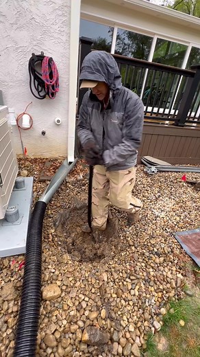 Hand digging a footer for the new addition that’s in between the main electrical supply and drain lines. #carlisleruffingconstruction Carlisle & Ruffing Construction | Columbus Basement Company
