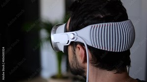 Exploring future through virtual reality glasses person experiences innovative technologies firsthand. Man in virtual reality glasses advancements of future technologies VR interactive environments.