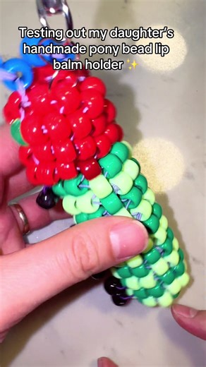 Testing out my daughter’s handmade pony bead lip balm holder ✨ #catapillar #ponybeads #kandikid #kandibracelet #lipbalmholder