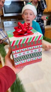 868K views · 9.7K reactions | The Toilet Paper Christmas Party Game  Dad and kids play family holiday game where they roll ornaments into toilet paper for prizes. | Benson Bros | Facebook