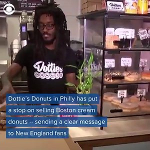 There's a feud going on between Philly and Boston, and it's about food. Ahead of the Super Bowl, this Philly donut shop banned Boston cream donuts -- and Boston retaliated 🍩 http://cbsn.ws/2DwGNP6 | CBS News