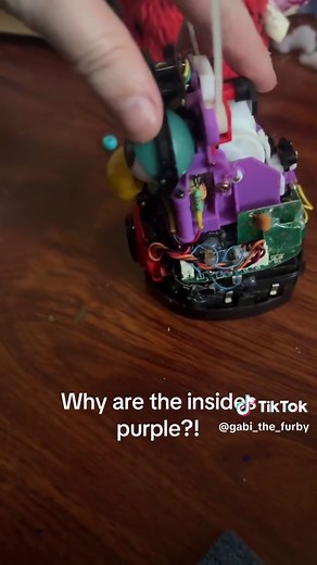 Purple Insides of Furby: Mystery Explained