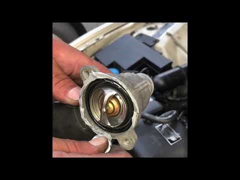 How to replace thermostat on Jaguar S type