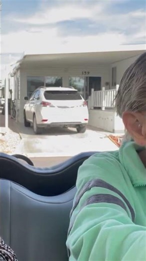 Ruby driving her golf cart Brett & Sandy bought