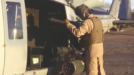 USMC Helicopter Gunships Launch A Night Attack