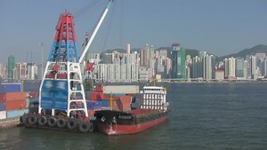 clip-242080-barge-derrick-crane-loading-shipping-container-onto