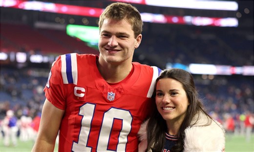 Drake Maye's wife Ann turns heads in fur coat to beat freezing 27°F Foxborough weather for Patriots QB's MNF debut vs. Giants